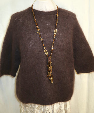 Kidmohairneule Monna ( lyhythiha)